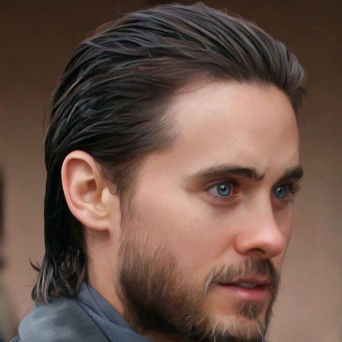 Long slick back hairstyle showing sophisticated executive styling for men