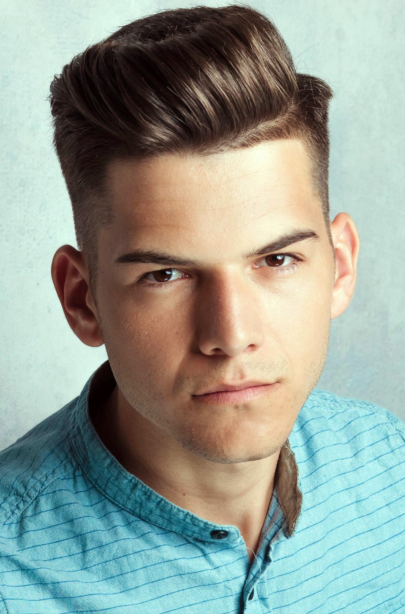 Professional side part hairstyle with volume and clean lines for business settings
