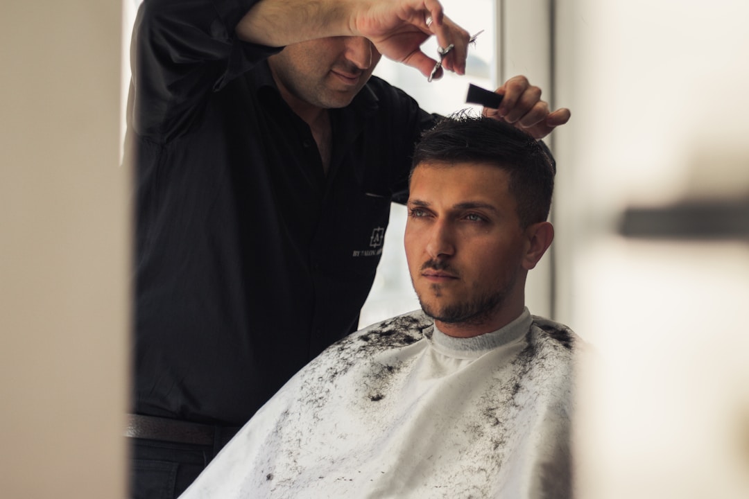 Professional low fade haircut for oval face men