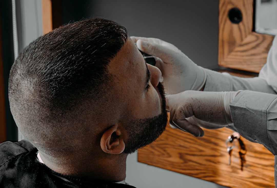 Precision fade and taper techniques showcasing mathematical accuracy and seamless transitions in professional barbering