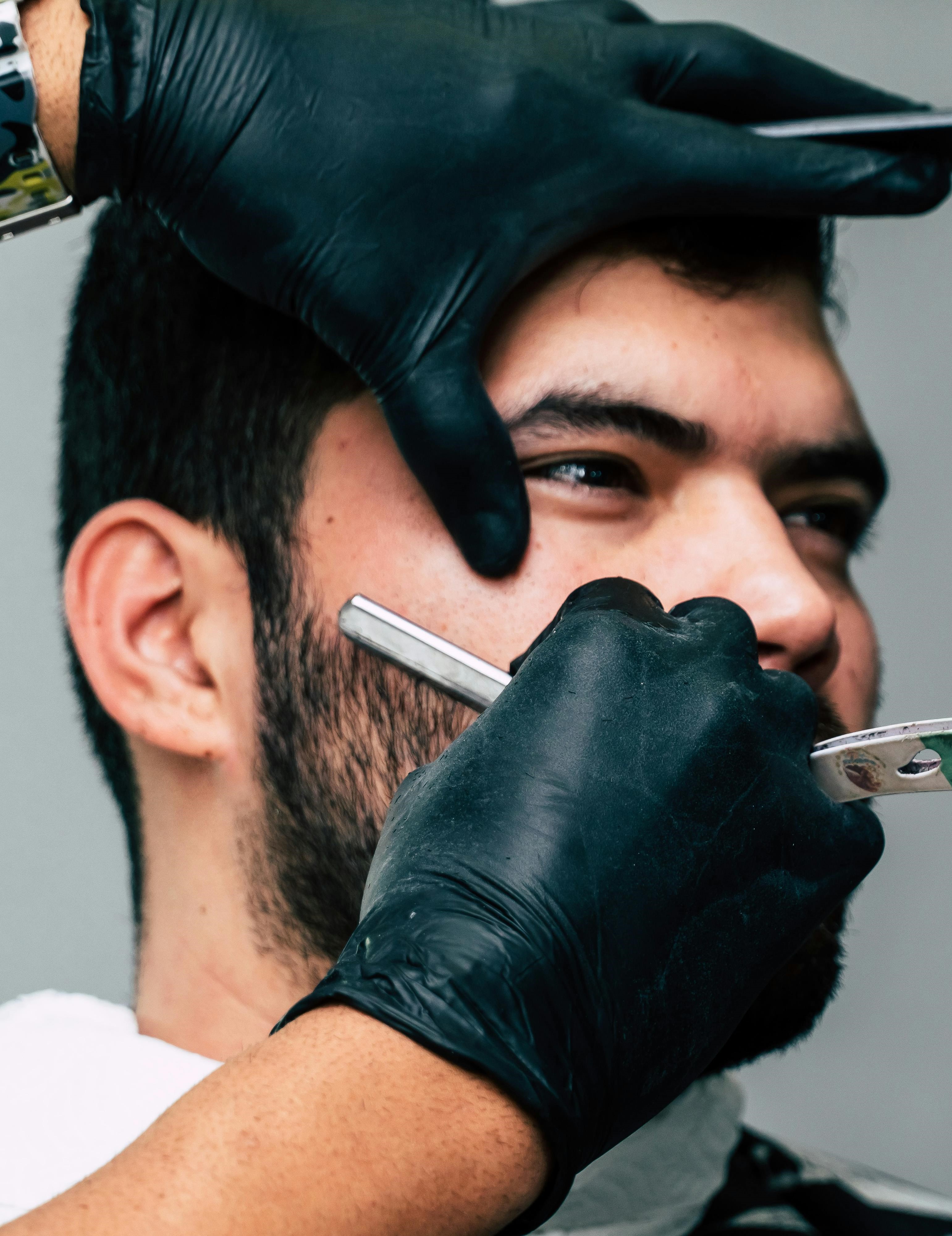 Professional eyebrow and razor trim service at DIDA Hair Studio