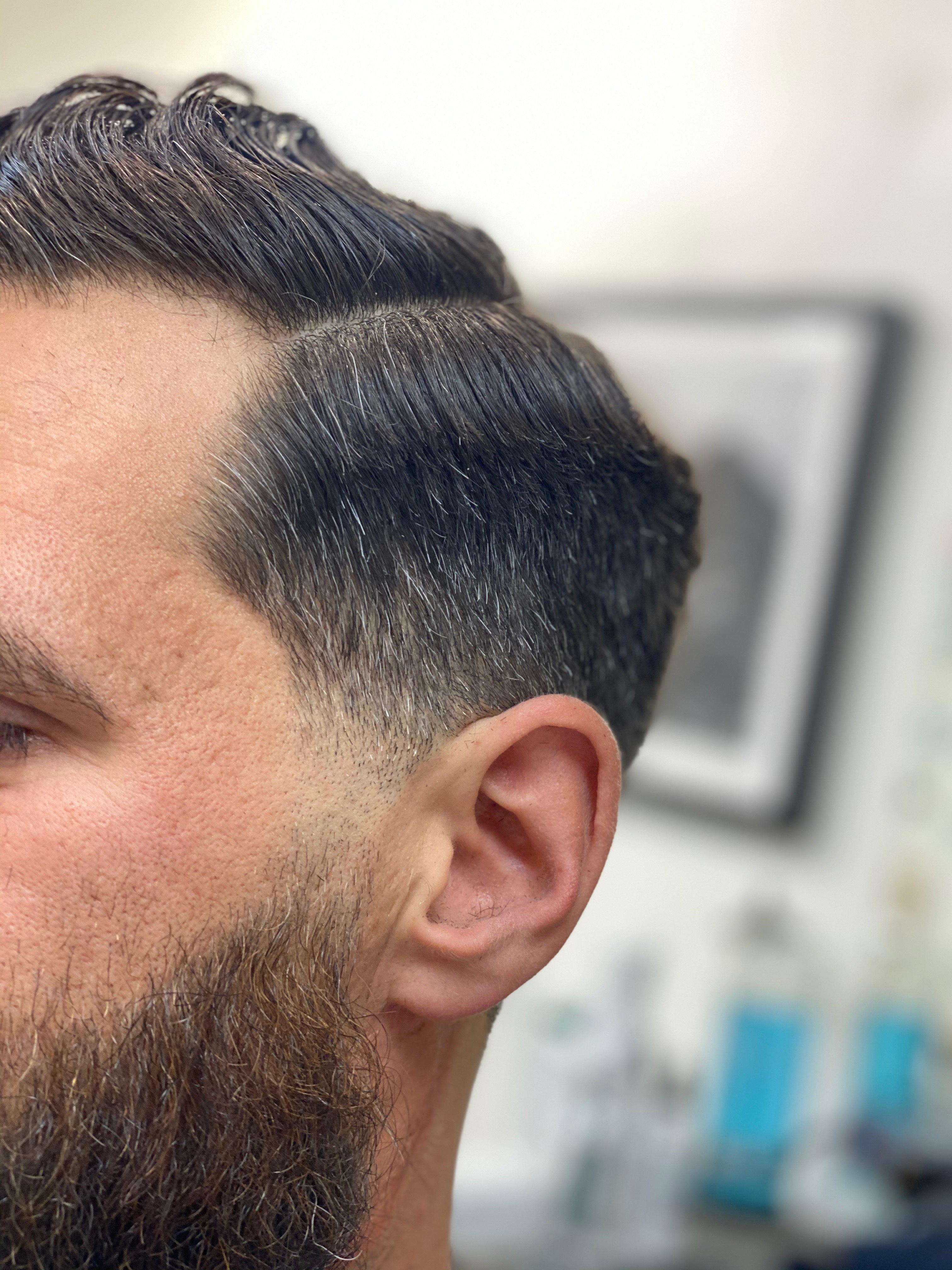 Professional super skin fade haircut technique at DIDA Hair Studio Queens NYC