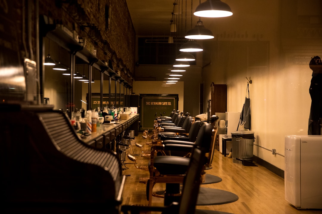 Modern barbershop interior providing professional environment for expert mens fade haircut services at DIDA NYC Hair Studio Queens